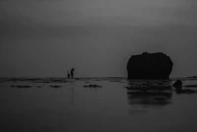 Scenic view of sea against sky at sunset