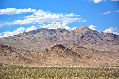 Scenic view of rocky mountains against sky