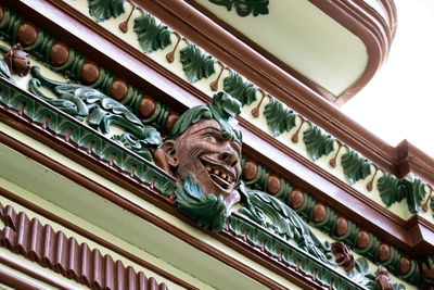 Famous devil at entrance door of the house of culture at the heritage town of salamina.