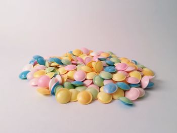 Close-up of colorful balls against white background