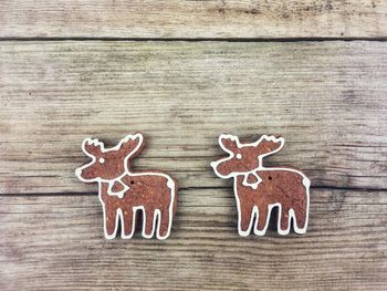 Close-up of gingerbread cookies on wooden table