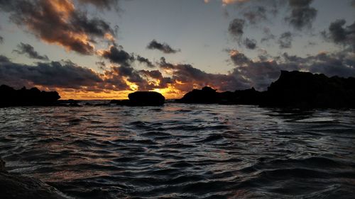 Scenic view of sea against sky during sunset