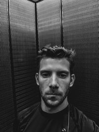 Portrait of young man indoors