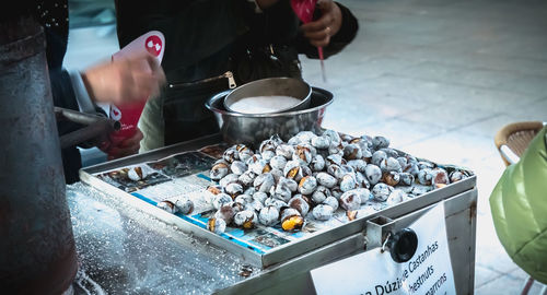 Midsection of man preparing food