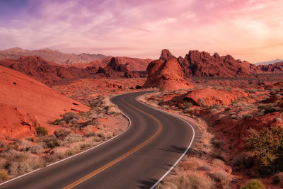 Scenic view of mountains against sky during sunset