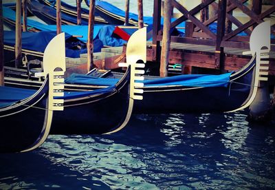 Boats moored in canal