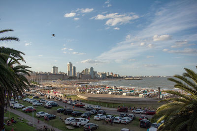 High angle view of buildings and city against sky