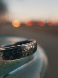 Close-up of text on metal ring