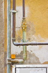 Close-up of metal pipe on wall