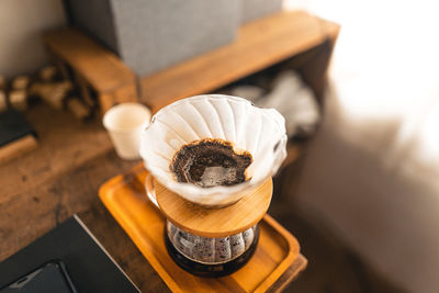 High angle view of coffee cup on table