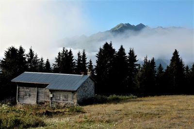 House on field against sky