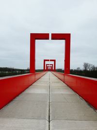 Red road against sky