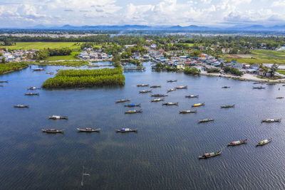 High angle view of floating on lake against sky