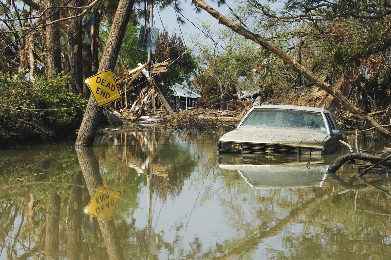 ABANDONED BOAT ON LAKE