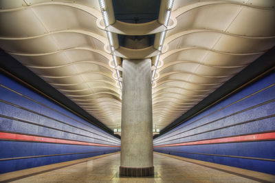Low angle view of illuminated lights on ceiling