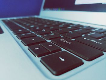 Close-up of computer keyboard on table