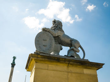 Low angle view of statue against sky