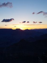 Scenic view of mountains at sunset