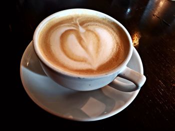 High angle view of cappuccino on table