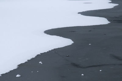 High angle view of frozen beach during winter