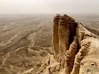 Rock formation on land against sky