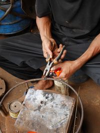 High angle view of man preparing food