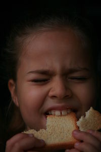 Close-up of woman eating food
