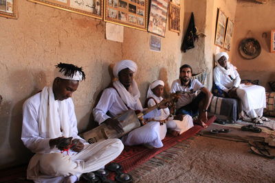 Group of people sitting in temple