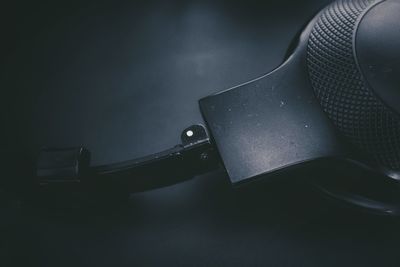 Close-up of headphones on black background