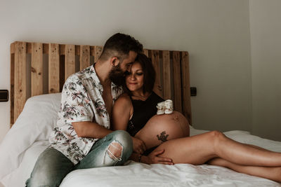 Young pregnant couple waiting for the baby. pregnancy session