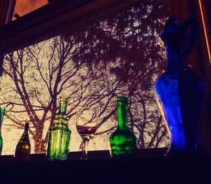 Close-up of beer bottles on table