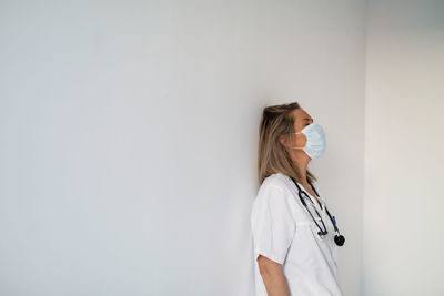 Female doctor wearing protective face mask