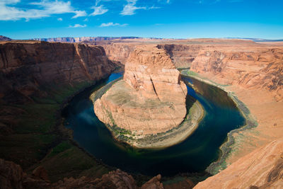 Aerial view of rock formations against sky