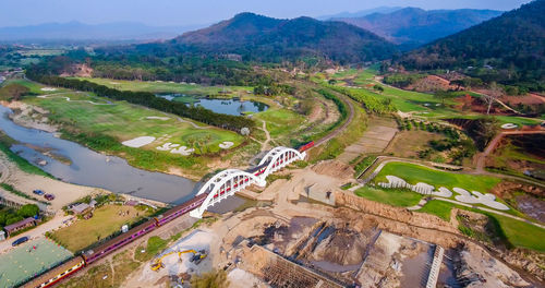 High angle view of road amidst mountains against sky