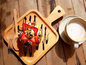High angle view of fruits in plate on table
