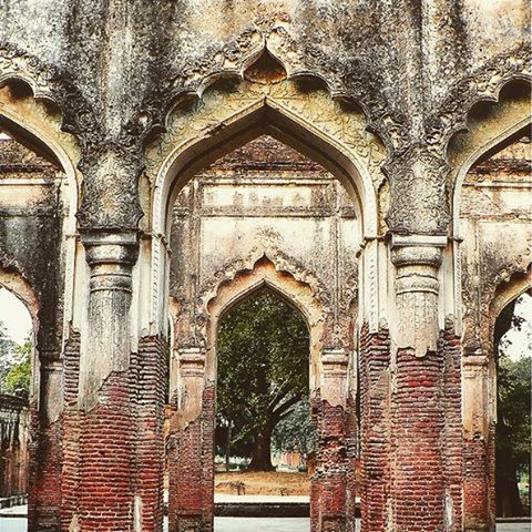 architecture, arch, built structure, building exterior, window, door, entrance, low angle view, old, place of worship, religion, church, history, building, day, historic, spirituality, architectural column, no people