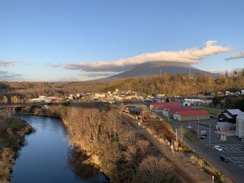 Panoramic view of buildings in city against sky