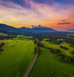 Scenic view of landscape against sky during sunset