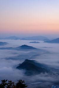 Scenic view of mountains against sky during sunset