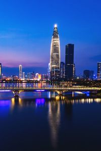 Illuminated buildings in city at night