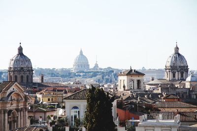 Cityscape against clear sky