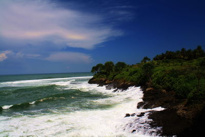 Scenic view of beach and sea against sky