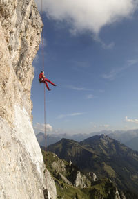 View of person rock climbing