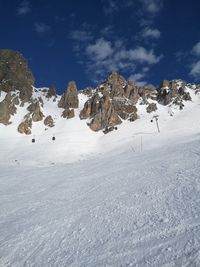 Snow covered mountain against sky