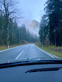 Road seen through car windshield