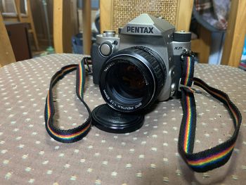 Close-up of camera on table