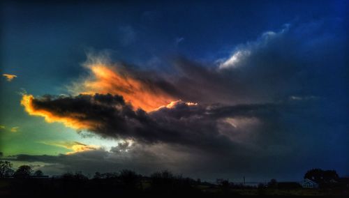 Low angle view of cloudy sky during sunset