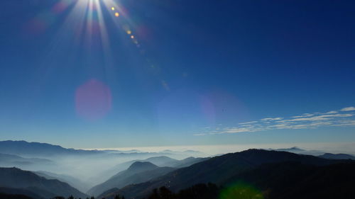 Sun shining on himalayan mountain range