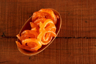 High angle view of orange fruit on table