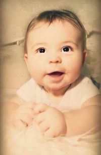 Close-up portrait of smiling baby